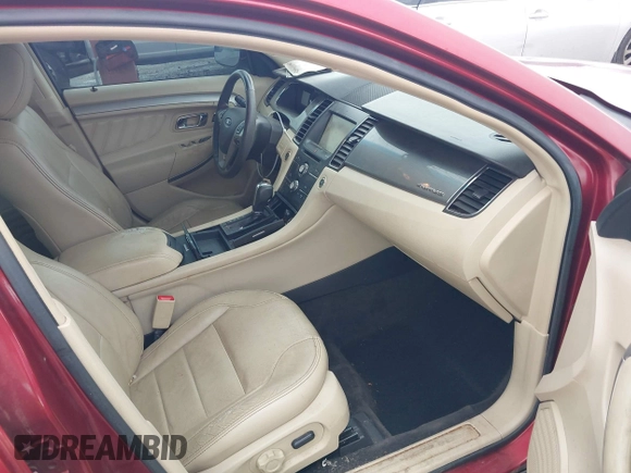 2015 Ford Taurus SEL with VIN 1FAHP2E8XFG137526, listed as a IAAI auction lot 41909658 with 147,992 mi miles and . Bid and sale history available at carsss.com. Image 5.