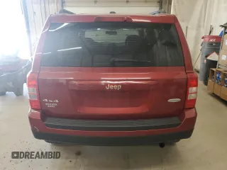 2014 Jeep Patriot Latitude with VIN 1C4NJRFB2ED734624, listed as a Copart auction lot 60675175 with 91,624 mi miles and Salvage title. Bid and sale history available at DreamBid. Image 6.
