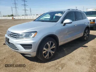 2017 Volkswagen Touareg Wolfsburg Edition с VIN WVGRF7BP6HD005745, выставлен на аукционе Copart как лот 54344405 с пробегом 101 150 миль миль и Списание • Salvage title. История ставок и продаж доступна на DreamBid. Изображение 1.