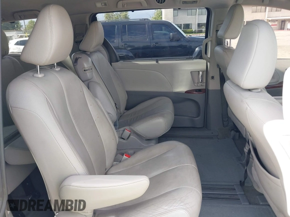 2012 Toyota Sienna XLE AAS z VIN 5TDYK3DCXCS278442, wystawiony jako IAAI lot #42228620 z przebiegiem 128 748 mil mil oraz . Historia ofert i sprzedaży dostępna na DreamBid. Obrazek 8.