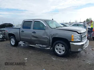 2013 Chevrolet Silverado 1500 LT with VIN 3GCPKSE70DG232285, listed as a IAAI auction lot 40881769 with 110,837 mi miles and . Bid and sale history available at DreamBid. Image 13.