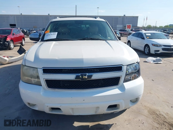 2010 Chevrolet Suburban LTZ with VIN 1GNUCKE06AR277074, listed as a IAAI auction lot 41828184 with 260,839 mi miles. Bid and sale history available at carsss.com. Image 13.