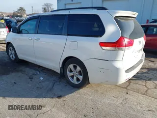 2014 Toyota Sienna LE AAS with VIN 5TDKK3DC2ES483679, listed as a IAAI auction lot 41547261 with 142,697 mi miles. Bid and sale history available at carsss.com. Image 3.