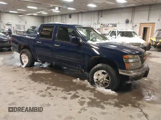 2011 GMC Canyon SLE1 with VIN 1GTH6MFE3B8123808, listed as a IAAI auction lot 41611231 with 142,877 mi miles. Bid and sale history available at carsss.com. Image 1.