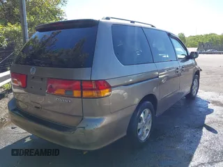2003 Honda Odyssey EX-L z VIN 5FNRL180X3B055800, wystawiony jako IAAI lot #42053575 z przebiegiem 203 398 mil mil oraz . Historia ofert i sprzedaży dostępna na DreamBid. Obrazek 4.