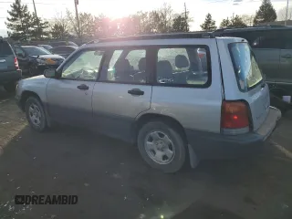1999 Subaru Forester L with VIN JF1SF6355XG739180, listed as a Copart auction lot 84467674 with 127,591 mi miles and Salvage Title. Bid and sale history available at carsss.com. Image 2.