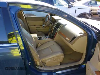 2009 Cadillac STS AWD w/1SB with VIN 1G6DD67VX90130281, listed as a IAAI auction lot 41384191 with 102,943 mi miles. Bid and sale history available at carsss.com. Image 5.