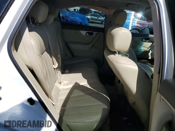 2014 Infiniti QX70 z VIN JN8CS1MU8EM450011, wystawiony jako Copart lot #47757235 z przebiegiem Nie podano mil oraz Szkoda całkowita • Salvage title. Historia ofert i sprzedaży dostępna na DreamBid. Obrazek 10.