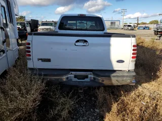 2001 Ford F-350 XL with VIN 1FTWW32F31ED39867, listed as a Copart auction lot 80069644 with 241,113 mi miles and Salvage title. Bid and sale history available at DreamBid. Image 6.