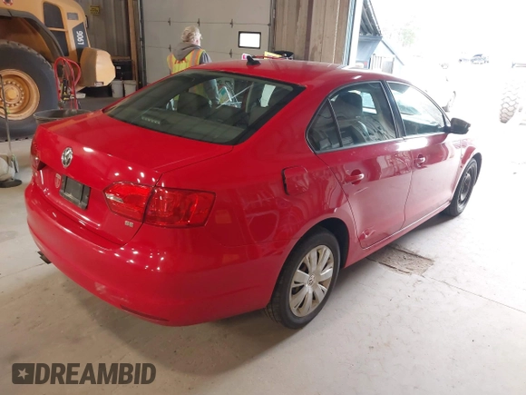 2014 Volkswagen Jetta SE z VIN 3VWD17AJ5EM249216, wystawiony jako IAAI lot #42096885 z przebiegiem 188 166 mil mil oraz . Historia ofert i sprzedaży dostępna na DreamBid. Obrazek 4.