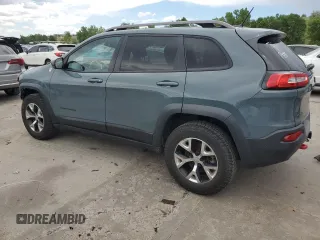 2015 Jeep Cherokee Trailhawk с VIN 1C4PJMBSXFW555223, выставлен на аукционе Copart как лот 62072235 с пробегом 207 240 миль миль и На запчасти • Non repairable. История ставок и продаж доступна на DreamBid. Изображение 2.