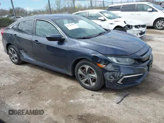 2019 Honda Civic LX with VIN 2HGFC2F61KH564474, listed as a IAAI auction lot 42156385 with 239,694 mi miles and . Bid and sale history available at DreamBid. Image 1.