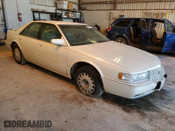 1993 Cadillac Seville Touring STS z VIN 1G6KY5295PU817593, wystawiony jako Copart lot #47807075 z przebiegiem Nie podano mil oraz Czysty tytuł • Clean title. Historia ofert i sprzedaży dostępna na DreamBid. Obrazek 4.