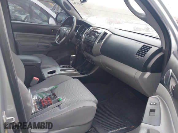 2012 Toyota Tacoma with VIN 3TMLU4ENXCM083340, listed as a IAAI auction lot 41704584 with 120,944 mi miles and . Bid and sale history available at DreamBid. Image 5.