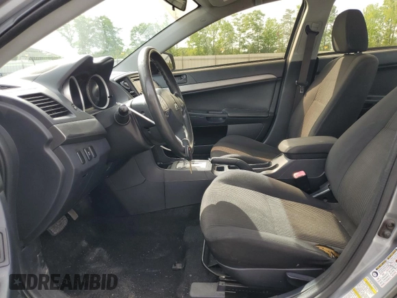 2014 Mitsubishi Lancer ES with VIN JA32U2FUXEU003358, listed as a Copart auction lot 55555935 with 185,151 mi miles and Salvage title. Bid and sale history available at DreamBid. Image 7.