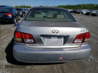 2002 Infiniti I35 Luxury z VIN JNKDA31A12T002704, wystawiony jako Copart lot #71402904 z przebiegiem 196 505 mil mil oraz Nie do naprawy • Non repairable. Historia ofert i sprzedaży dostępna na DreamBid. Obrazek 6.