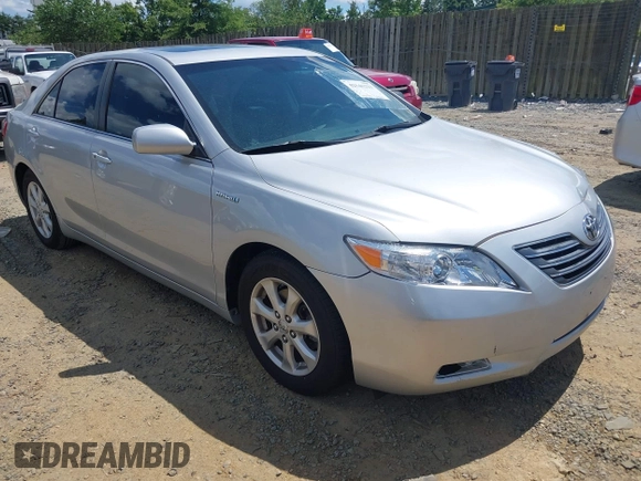 2007 Toyota Camry z VIN 4T1BB46K37U007610, wystawiony jako IAAI lot #42546223 z przebiegiem 252 363 mil mil oraz . Historia ofert i sprzedaży dostępna na DreamBid. Obrazek 1.