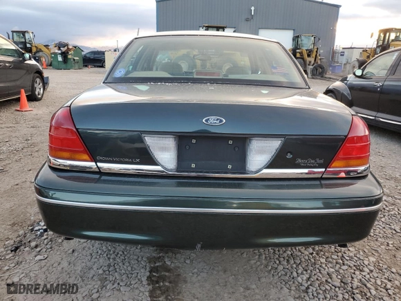 1998 Ford Crown Victoria LX with VIN 2FAFP74W9WX171309, listed as a Copart auction lot 80585734 with 192,162 mi miles and Salvage Title. Bid and sale history available at carsss.com. Image 6.