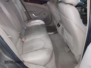 2011 Cadillac CTS Luxury with VIN 1G6DG5EY9B0135220, listed as a IAAI auction lot 42596045 with 158,912 mi miles and . Bid and sale history available at DreamBid. Image 8.