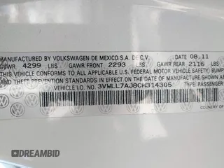 2012 Volkswagen Jetta TDI w/Premium with VIN 3VWLL7AJ8CM314305, listed as a IAAI auction lot 41885355 with 75,669 mi miles and . Bid and sale history available at DreamBid. Image 9.