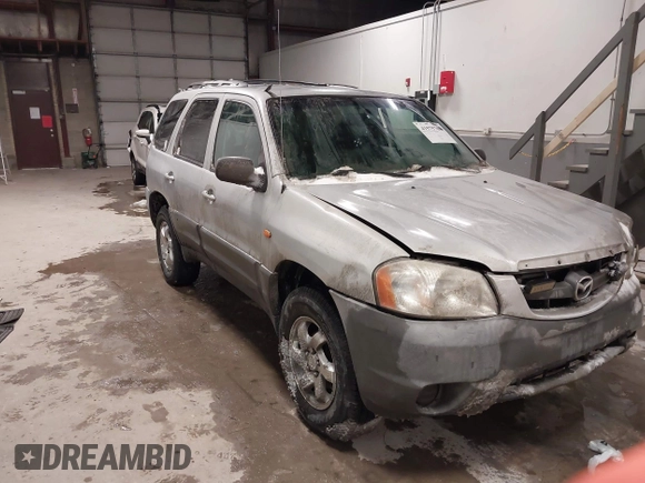 2003 Mazda Tribute DX with VIN 4F2YZ02B73KM43813, listed as a IAAI auction lot 41575708 with 202,214 mi miles and . Bid and sale history available at carsss.com. Image 1.