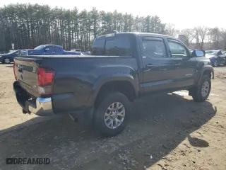 2019 Toyota Tacoma 4WD SR with VIN 3TMCZ5AN7KM213103, listed as a Copart auction lot 52088505 with 79,926 mi miles and Salvage Title. Bid and sale history available at carsss.com. Image 3.