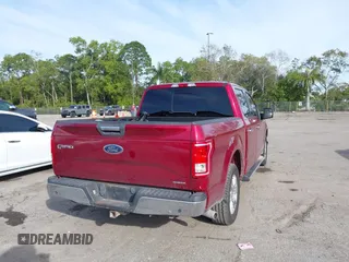 2015 Ford F-150 XLT with VIN 1FTEW1C87FKD70547, listed as a IAAI auction lot 41451841 with 151,596 mi miles and . Bid and sale history available at carsss.com. Image 12.