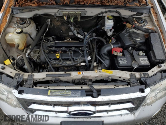 2009 Ford Escape XLS with VIN 1FMCU02779KB55136, listed as a Copart auction lot 81513864 with 108,906 mi miles and Salvage title. Bid and sale history available at DreamBid. Image 12.