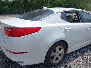 2014 Kia Optima LX with VIN 5XXGM4A74EG317632, listed as a IAAI auction lot 42172027 with 122,879 mi miles and . Bid and sale history available at DreamBid. Image 6.
