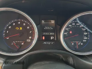 2012 Jeep Grand Cherokee SRT8 with VIN 1C4RJFDJ9CC346867, listed as a Copart auction lot 86349154 with 125,130 mi miles and Salvage Title. Bid and sale history available at carsss.com. Image 9.