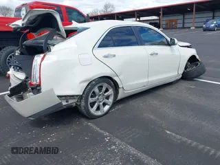 2013 Cadillac ATS Performance with VIN 1G6AC5S32D0145128, listed as a IAAI auction lot 41828380 with 117,321 mi miles and . Bid and sale history available at carsss.com. Image 4.