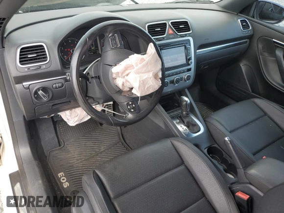 2013 Volkswagen Eos Sport с VIN WVWBW8AH8DV001948, выставлен на аукционе Copart как лот 56292615 с пробегом 75 398 миль миль и На запчасти • Non repairable. История ставок и продаж доступна на DreamBid. Изображение 8.