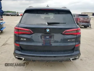2023 BMW X5 sDrive40i with VIN 5UXCR4C07P9N48328, listed as a Copart auction lot 57619515 with 32,174 mi miles and Salvage title. Bid and sale history available at DreamBid. Image 6.