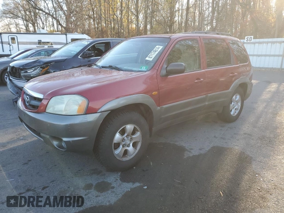 2001 Mazda Tribute LX with VIN 4F2CU08111KM19933, listed as a Copart auction lot 81174614 with 209,736 mi miles and Salvage Title. Bid and sale history available at DreamBid. Image 1.