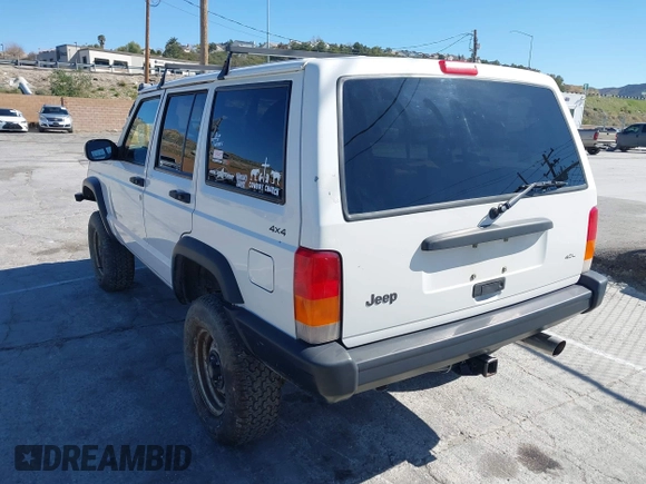 1997 Jeep Cherokee SE with VIN 1J4FJ28S7VL553270, listed as a IAAI auction lot 41825524 with 157,015 mi miles. Bid and sale history available at carsss.com. Image 3.