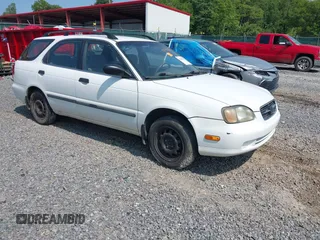 1999 Suzuki Esteem z VIN JS2GB31W5X5162688, wystawiony jako IAAI lot #42388032 z przebiegiem 212 622 mil mil oraz . Historia ofert i sprzedaży dostępna na DreamBid. Obrazek 1.
