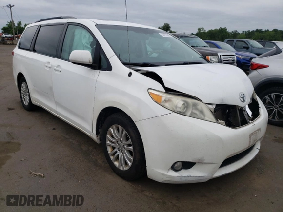 2011 Toyota Sienna XLE AAS with VIN 5TDYK3DCXBS063948, listed as a Copart auction lot 59776695 with 305,799 mi miles and Salvage title. Bid and sale history available at DreamBid. Image 4.
