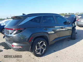 2022 Hyundai Tucson SEL with VIN 5NMJCCAE0NH138863, listed as a IAAI auction lot 41888998 with 28,734 mi miles. Bid and sale history available at carsss.com. Image 4.