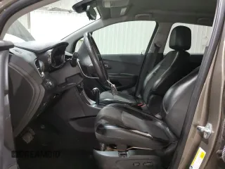 2021 Chevrolet Trax LT z VIN KL7CJLSB0MB309369, wystawiony jako Copart lot #52088635 z przebiegiem 175 258 mil mil oraz Tytuł czysty. Historia ofert i sprzedaży dostępna na DreamBid. Obrazek 7.
