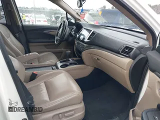 2017 Honda Pilot EX-L with VIN 5FNYF6H52HB015651, listed as a IAAI auction lot 41538814 with 121,433 mi miles and . Bid and sale history available at DreamBid. Image 5.