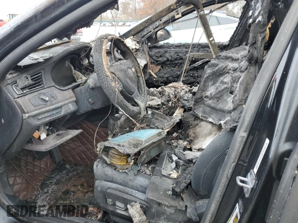 2013 BMW 7 Series 740Li with VIN WBAYE4C50DD137454, listed as a Copart auction lot 84876294 with Not provided miles and Salvage title. Bid and sale history available at DreamBid. Image 7.