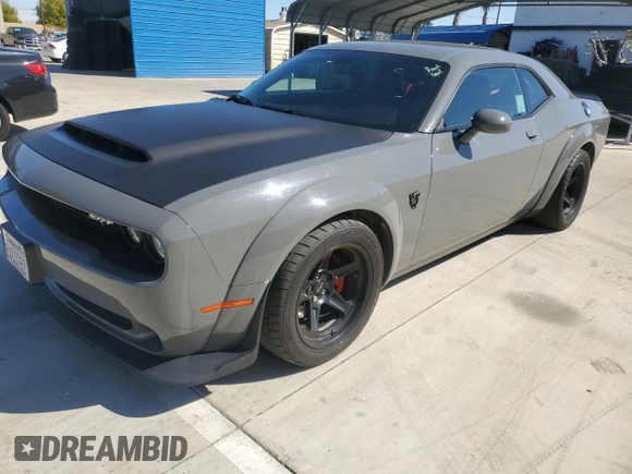 2018 Dodge Challenger z VIN 2C3CDZH90JH102960, wystawiony jako Copart lot #49121955 z przebiegiem 39 574 mil mil oraz Czysty tytuł • Clean title. Historia ofert i sprzedaży dostępna na DreamBid. Obrazek 2.