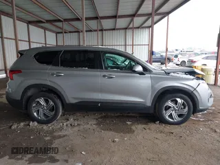 2021 Hyundai Santa Fe SE with VIN 5NMS14AJ4MH330556, listed as a IAAI auction lot 41297743 with 101,156 mi miles. Bid and sale history available at carsss.com. Image 13.