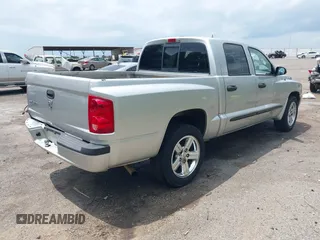 2007 Dodge Dakota SLT z VIN 1D7HE48K27S127788, wystawiony jako IAAI lot #42311626 z przebiegiem 357 130 mil mil oraz . Historia ofert i sprzedaży dostępna na DreamBid. Obrazek 4.