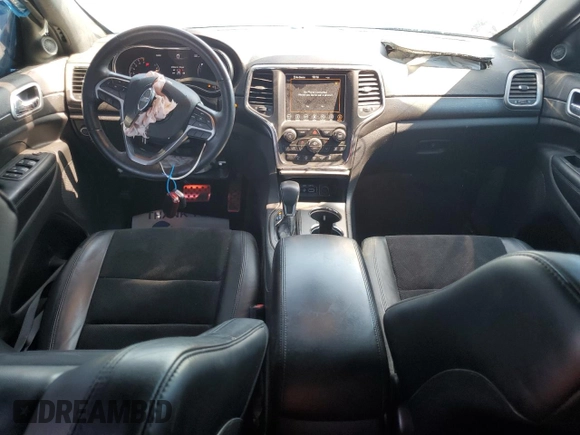 2018 Jeep Grand Cherokee Laredo E with VIN 1C4RJEAG0JC361922, listed as a Copart auction lot 56972245 with 82,237 mi miles and Salvage title. Bid and sale history available at DreamBid. Image 8.