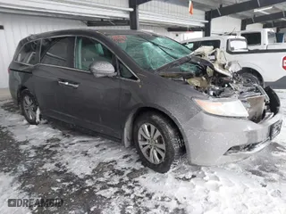 2016 Honda Odyssey SE with VIN 5FNRL5H32GB155946, listed as a IAAI auction lot 41590237 with 140,167 mi miles. Bid and sale history available at carsss.com. Image 1.