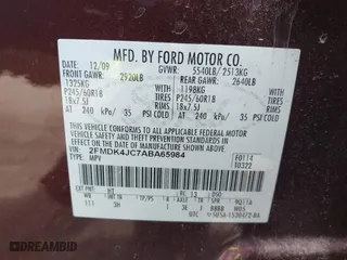 2010 Ford Edge SEL with VIN 2FMDK4JC7ABA65984, listed as a IAAI auction lot 41993337 with 215,137 mi miles. Bid and sale history available at carsss.com. Image 9.