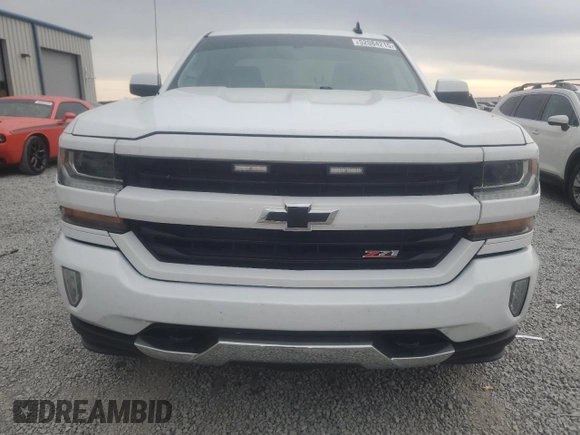 2018 Chevrolet Silverado 1500 LT with VIN 1GCVKREC7JZ176712, listed as a Copart auction lot 52084215 with 154,521 mi miles and Salvage Title. Bid and sale history available at DreamBid. Image 5.