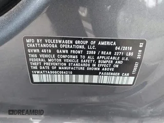 2016 Volkswagen Passat S with VIN 1VWAT7A30GC054210, listed as a IAAI auction lot 42452304 with 119,842 mi miles and . Bid and sale history available at DreamBid. Image 9.