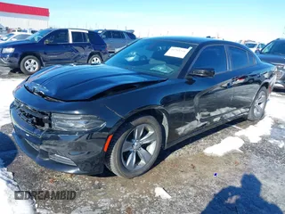 2015 Dodge Charger SXT with VIN 2C3CDXHG5FH841090, listed as a IAAI auction lot 41293591 with 107,732 mi miles and . Bid and sale history available at DreamBid. Image 2.